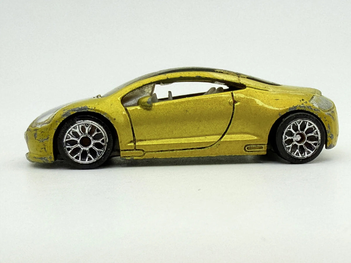 Mitsubishi Eclipse Matchbox Żółty 1:64 – zdjęcie 3