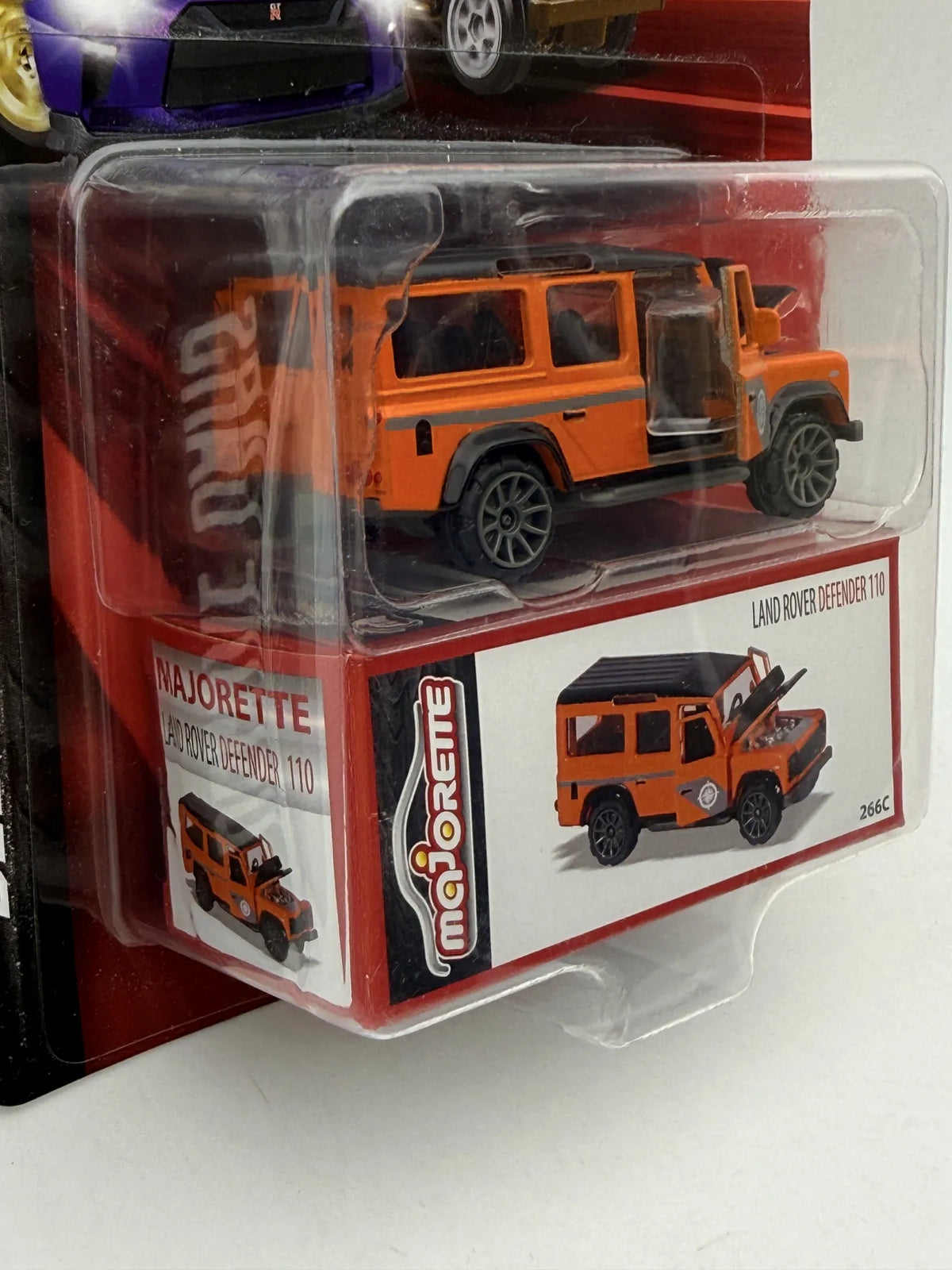 LAND ROVER DEFENDER 110 Deluxe Cars Majorette Pomarańczowy 1:64 – zdjęcie 3