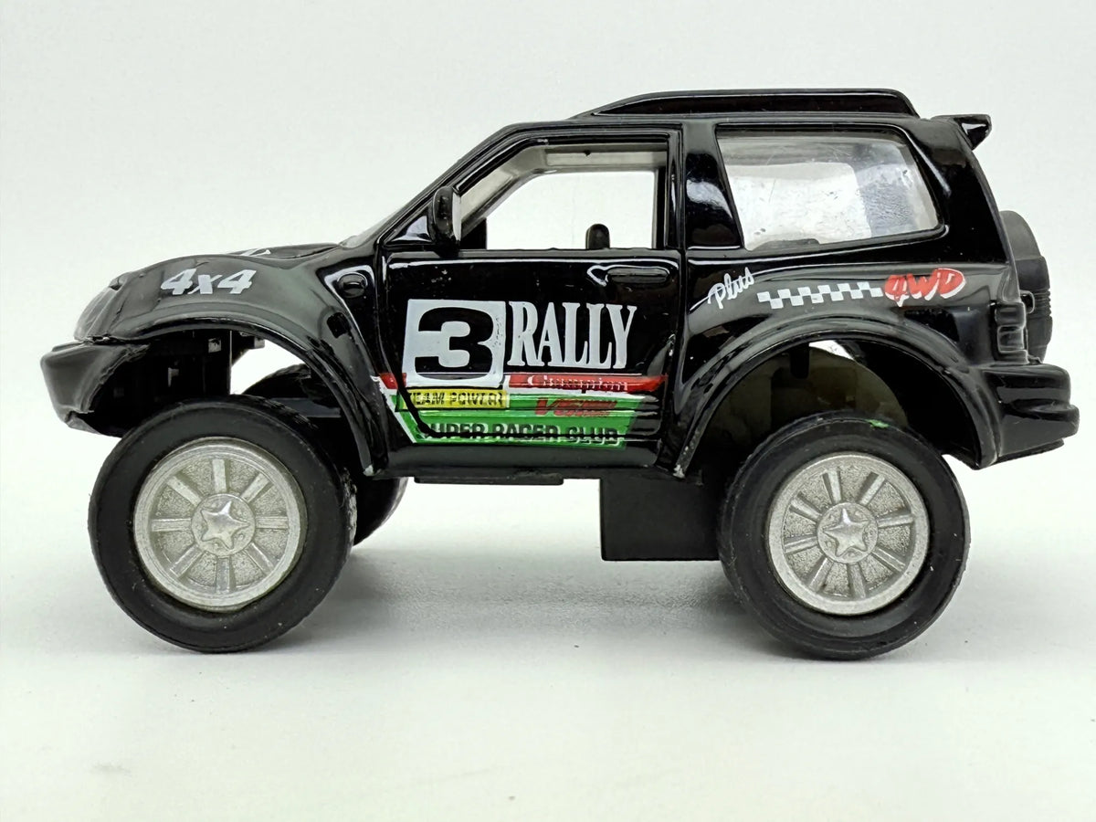 Jak Mitsubishi Pajero Rally 4X4 Czarny 1:43 – zdjęcie 4