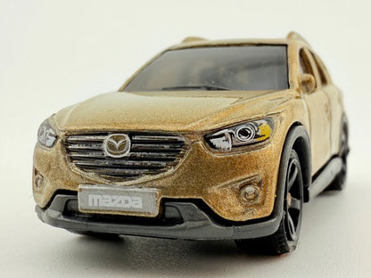 '16 Mazda CX-5 Matchbox 2017 Złoty 1:64 – zdjęcie 4