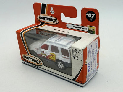 NISSAN XTERRA Surf Patrol Matchbox 2001 Biały 1:64 – zdjęcie 4