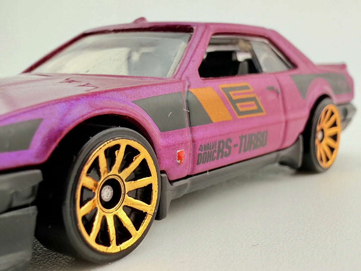 '82 Nissan Skyline R30 Hot Wheels 2017 Fioletowy 1:64 – zdjęcie 4