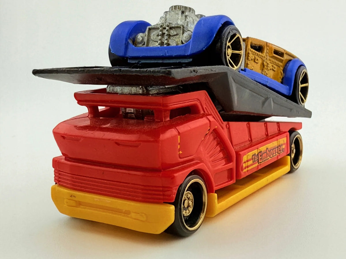 The Embosser Hot Wheels 2010 Żółty, 1:64 – zdjęcie 4