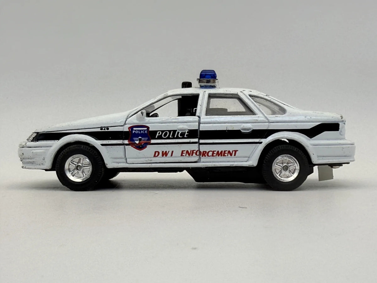 SHOWCASTS FORD TAURUS POLICE POLICJA Welly Biały 1:30 – zdjęcie 4