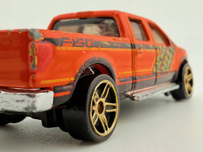 2009 Ford F-150 Mainline Hot Wheels 2012 Pomarańczowy 1:64 – zdjęcie 4