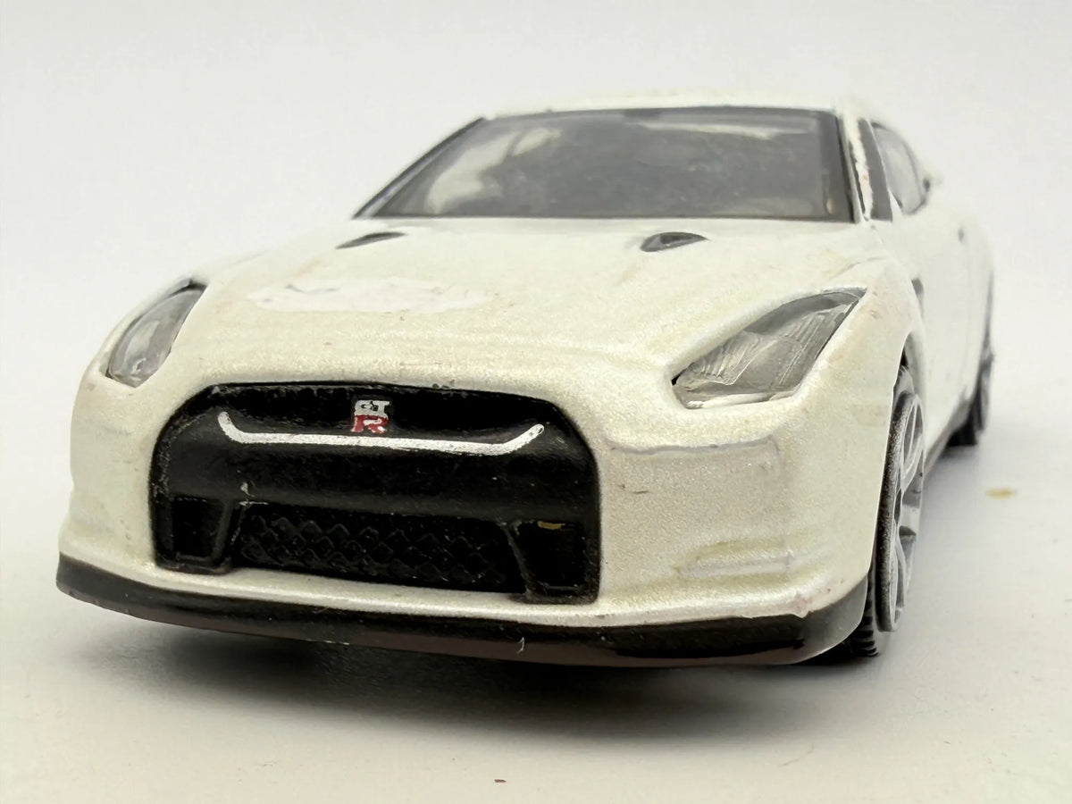 2009 NISSAN GT-R, Bburago 2009, Die cast 1143, Biały, 1:43, Resoraki – zdjęcie 4
