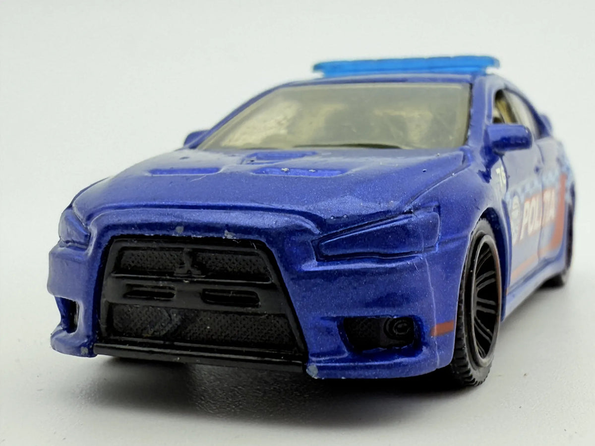 Mitsubishi Lancer Evolution X Police 2010, Matchbox, Resoraki Die cast 1:64 – zdjęcie 4