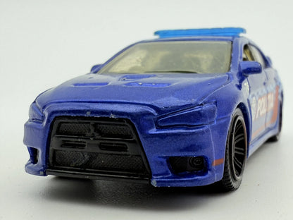 Mitsubishi Lancer Evolution X Police 2010, Matchbox, Resoraki Die cast 1:64 – zdjęcie 4