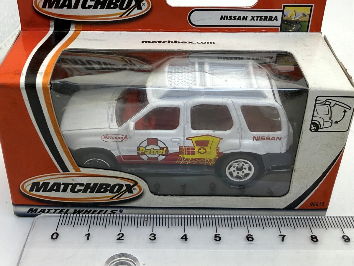 NISSAN XTERRA Surf Patrol Matchbox 2001 Biały 1:64 – zdjęcie 5
