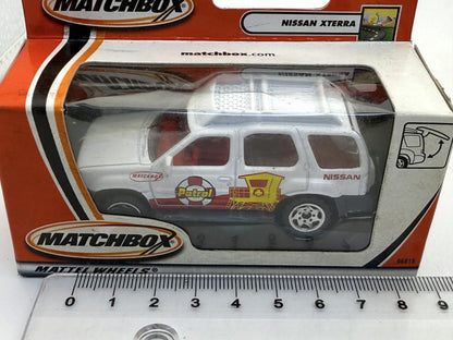 NISSAN XTERRA Surf Patrol Matchbox 2001 Biały 1:64 – zdjęcie 5