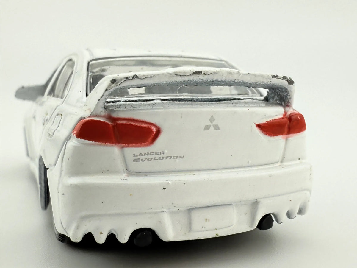 MITSUBISHI LANCER EVOLUTION, Bburago, Die cast 11524, Biały, 1:64, Resoraki – zdjęcie 5