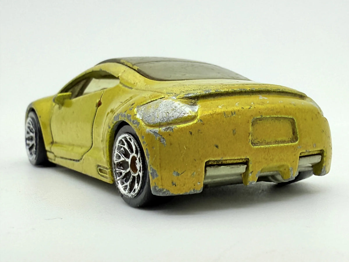 Mitsubishi Eclipse Matchbox Żółty 1:64 – zdjęcie 5