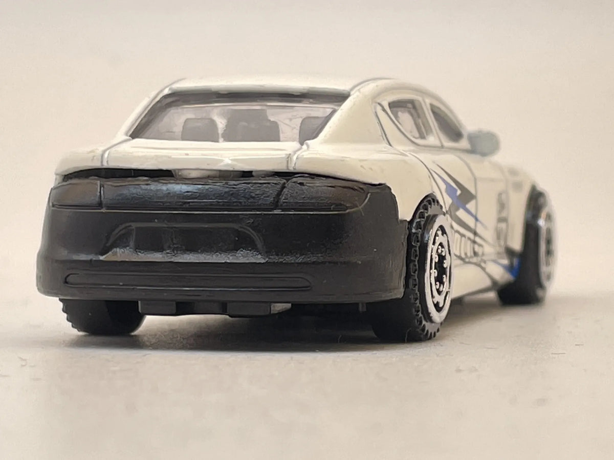 Jak Aston Martin Rapide POLICE, Resoraki, Die cast, Biały, 1:64 – zdjęcie 5