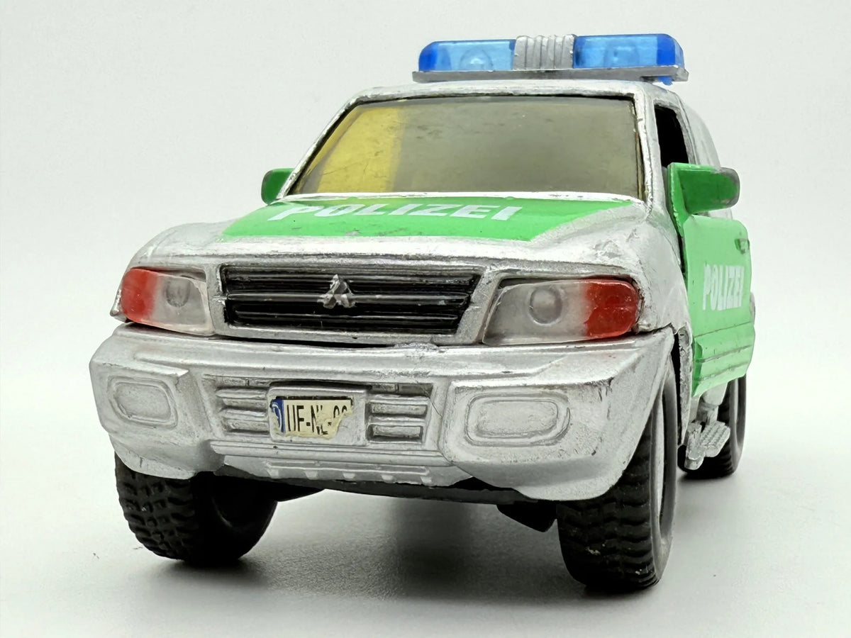 Mitsubishi Pajero POLICE, Suv Policyjny, resoraki, die cast, 1:43 – zdjęcie 5
