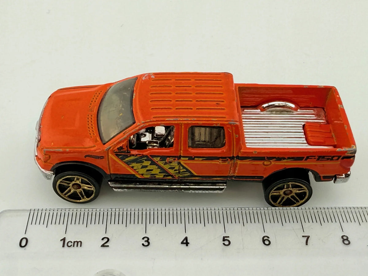 2009 Ford F-150 Mainline Hot Wheels 2012 Pomarańczowy 1:64 – zdjęcie 6