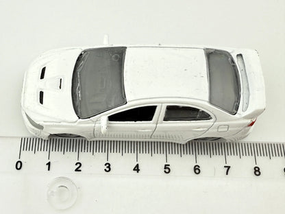MITSUBISHI LANCER EVOLUTION, Bburago, Die cast 11524, Biały, 1:64, Resoraki – zdjęcie 6