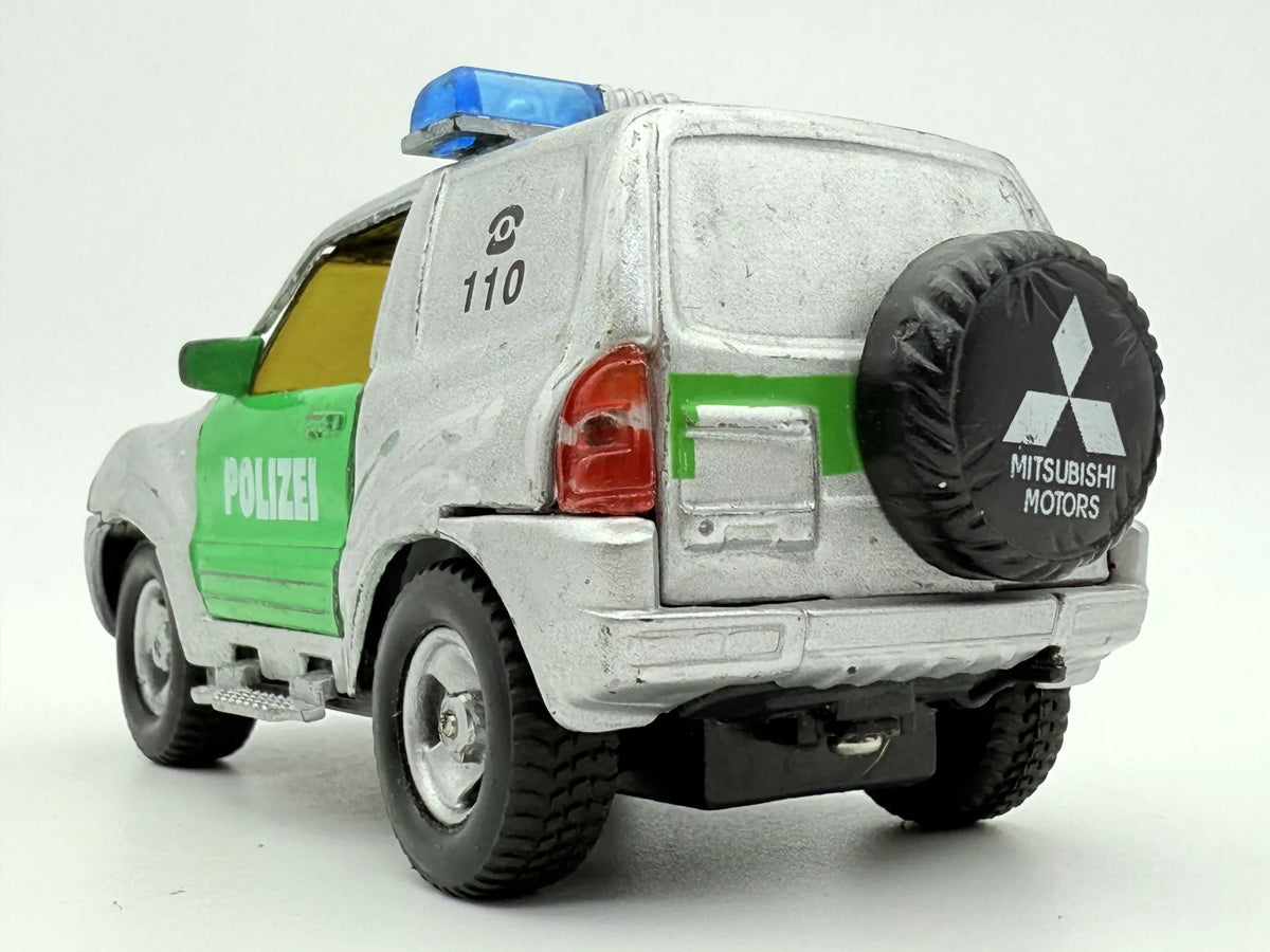 Mitsubishi Pajero POLICE, Suv Policyjny, resoraki, die cast, 1:43 – zdjęcie 6