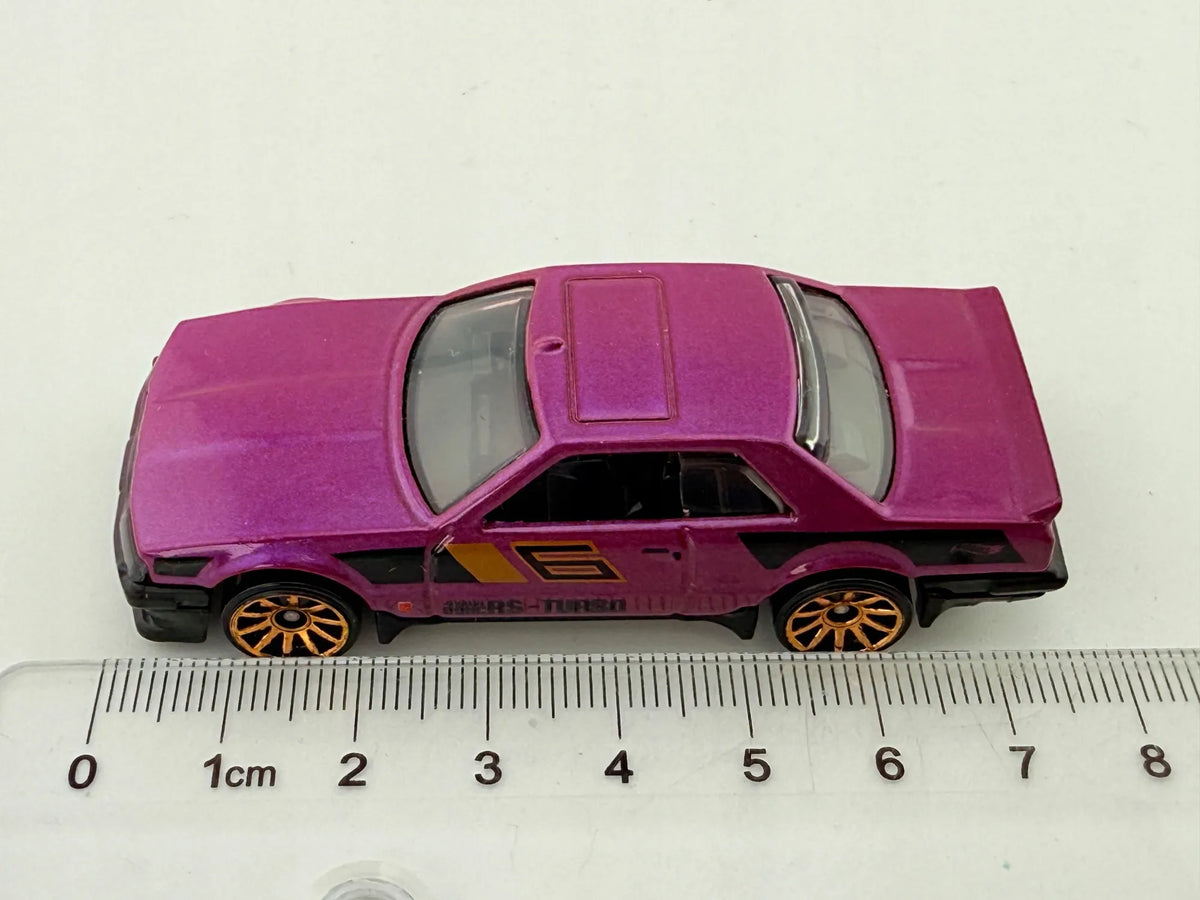 '82 Nissan Skyline R30 Hot Wheels 2017 Fioletowy 1:64 – zdjęcie 7