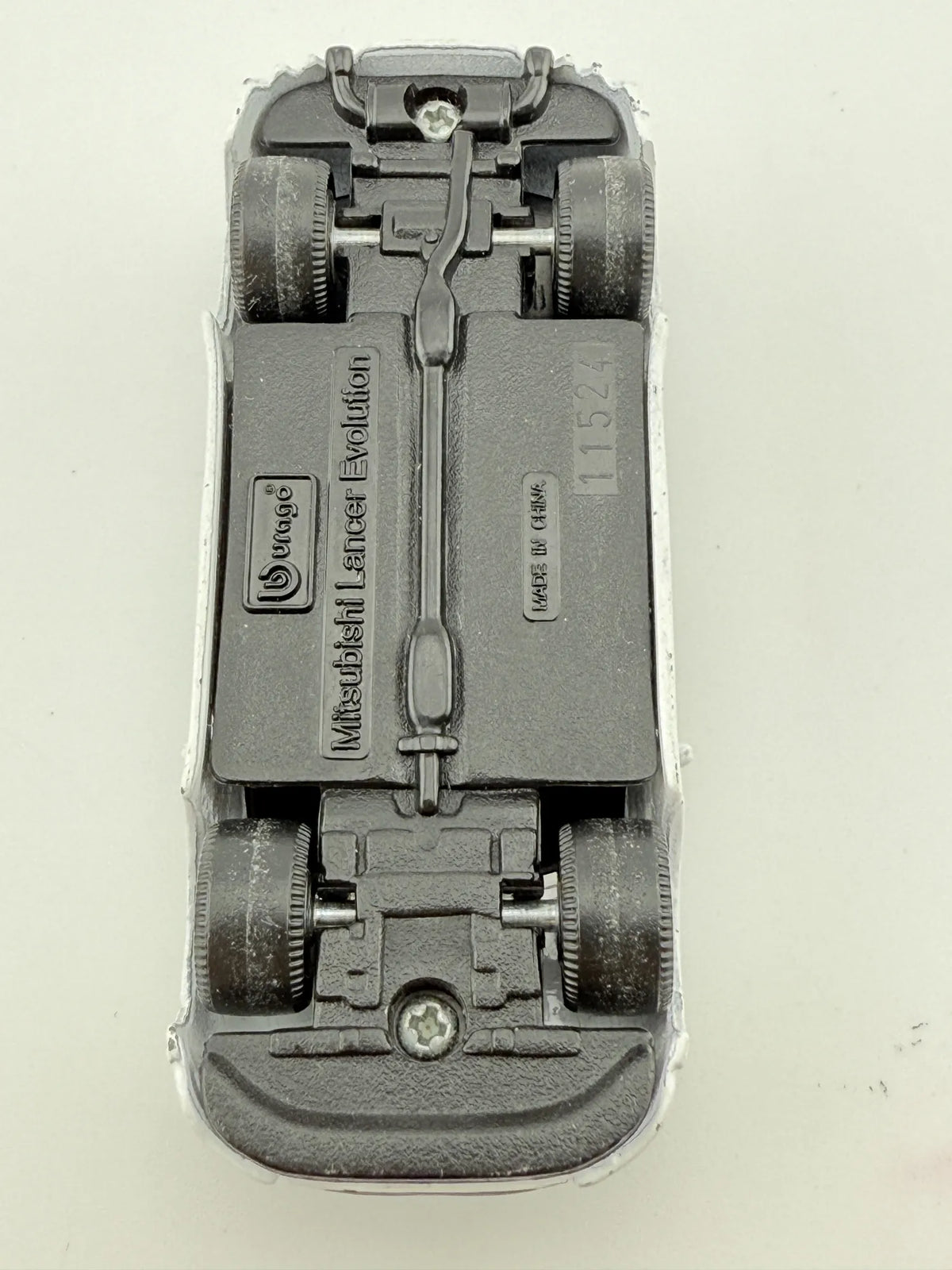MITSUBISHI LANCER EVOLUTION, Bburago, Die cast 11524, Biały, 1:64, Resoraki – zdjęcie 7