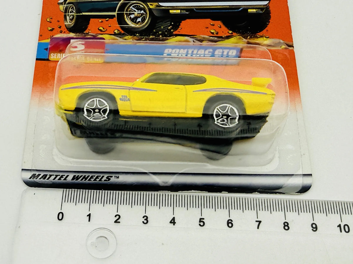 Pontiac GTO Matchbox 1997 Matchbox Series 1:64 Blister Żółty Muscle Car – zdjęcie 7