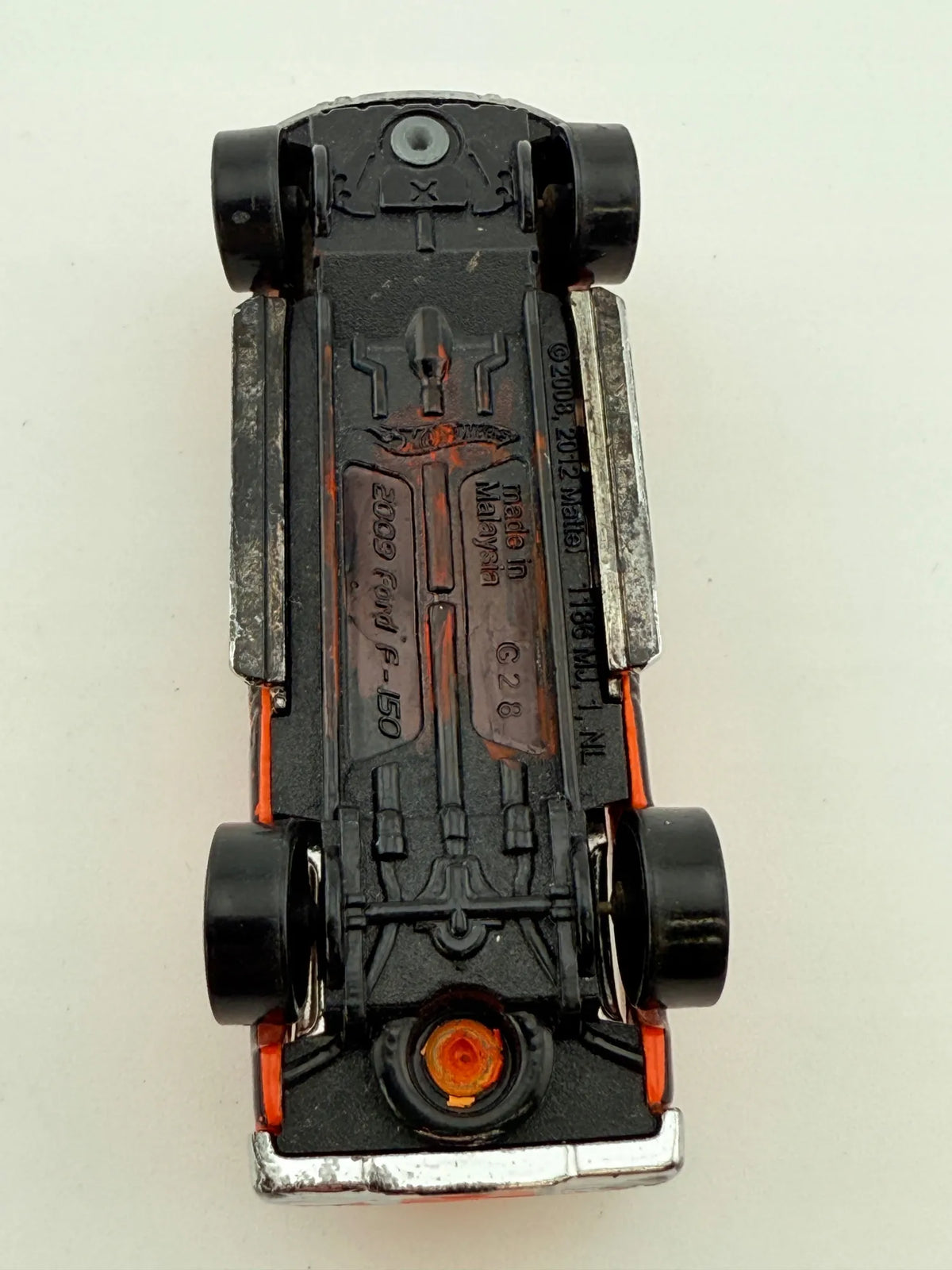 2009 Ford F-150 Mainline Hot Wheels 2012 Pomarańczowy 1:64 – zdjęcie 7