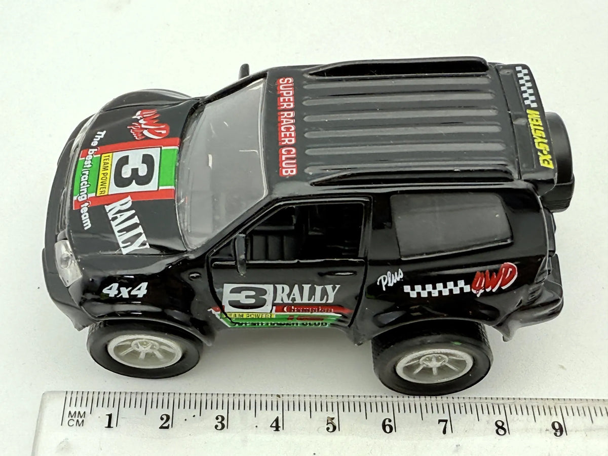 Jak Mitsubishi Pajero Rally 4X4 Czarny 1:43 – zdjęcie 7