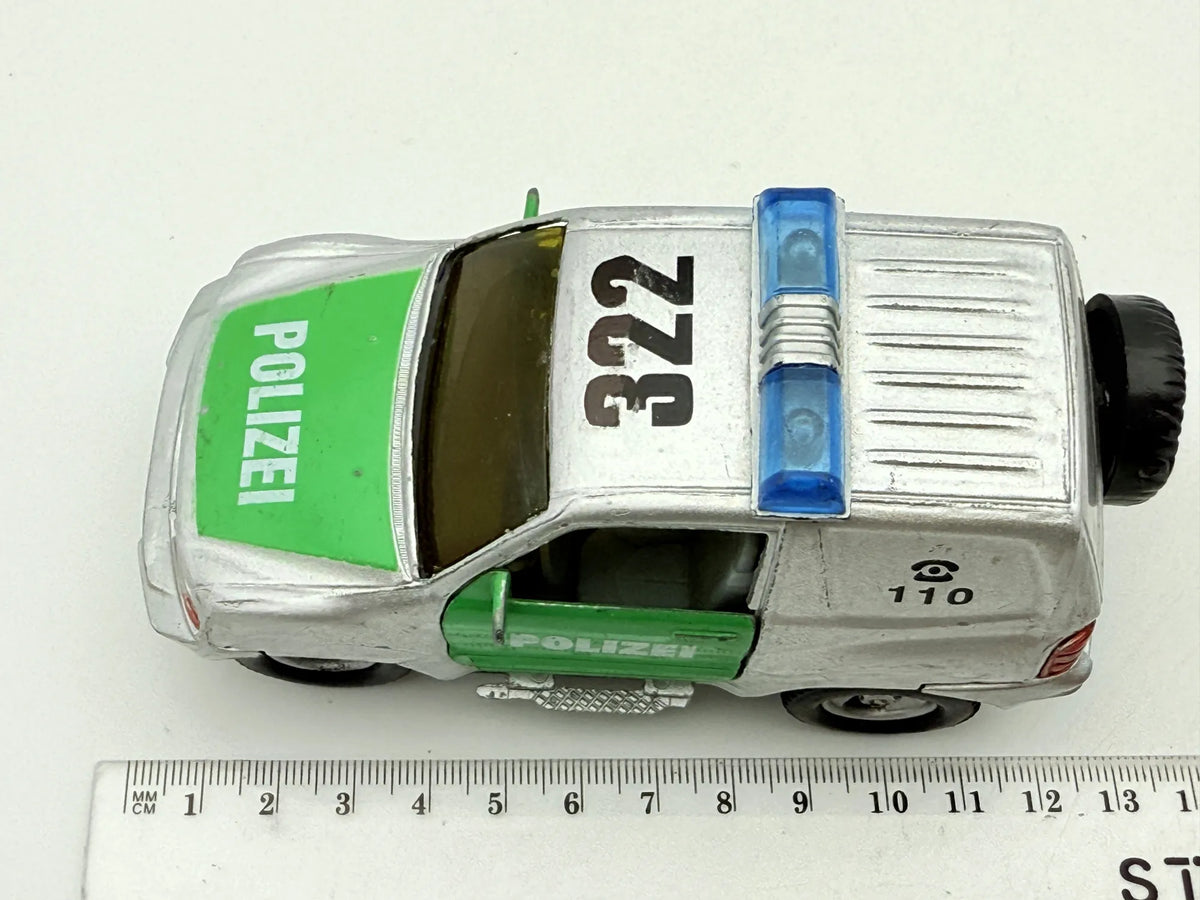 Mitsubishi Pajero POLICE, Suv Policyjny, resoraki, die cast, 1:43 – zdjęcie 8
