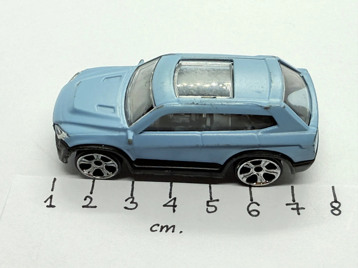 Range Rover Evoque Coupe Fresh Metal Maisto Niebieski 1:62 – zdjęcie 8