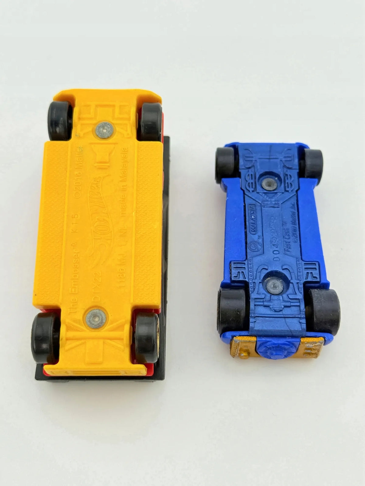 The Embosser Hot Wheels 2010 Żółty, 1:64 – zdjęcie 10