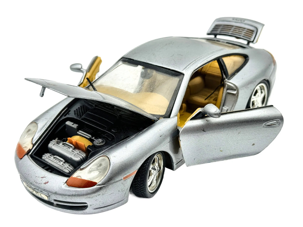 Porsche 911 Carrera 996 Welly 1999 1:18 Luzak Srebrny