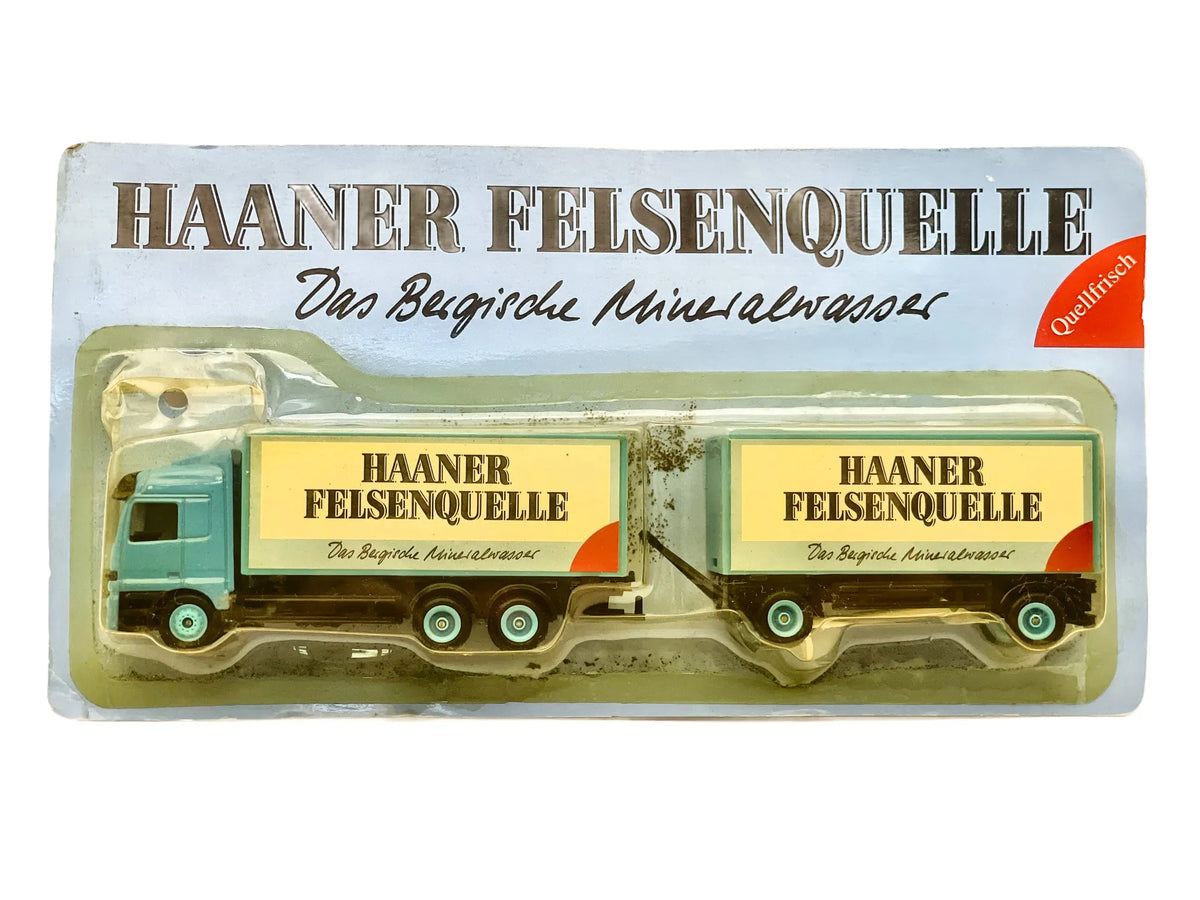 Mercedes-Benz Actros Grell 1:87 HAANER FELSENQUELLE Blister Turkusowy