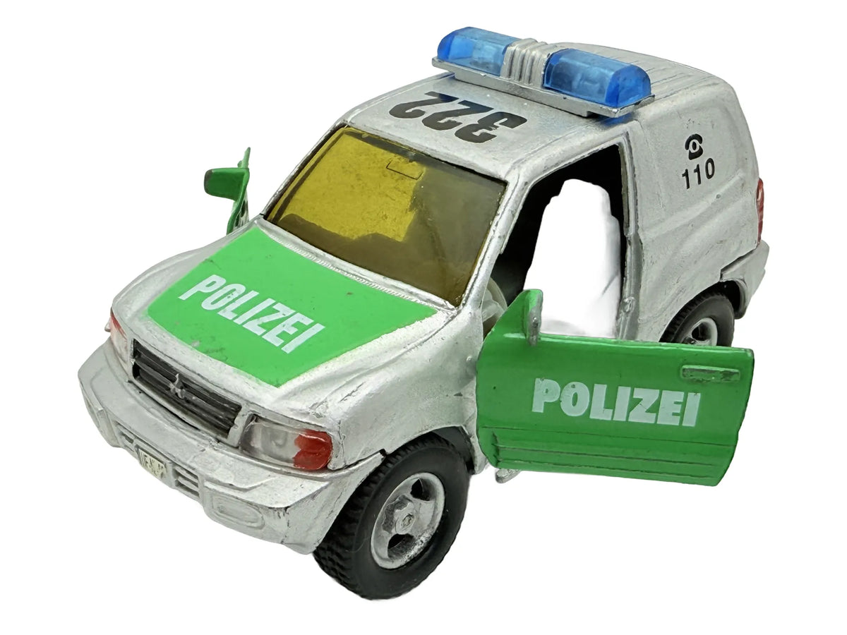 Mitsubishi Pajero POLICE, Suv Policyjny, resoraki, die cast, 1:43