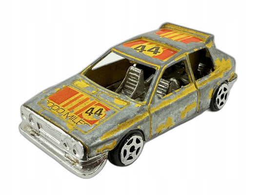 Jak Lancia Summer Lata 80. Żółty 1:64 Made in Spain 120 2000 MILES