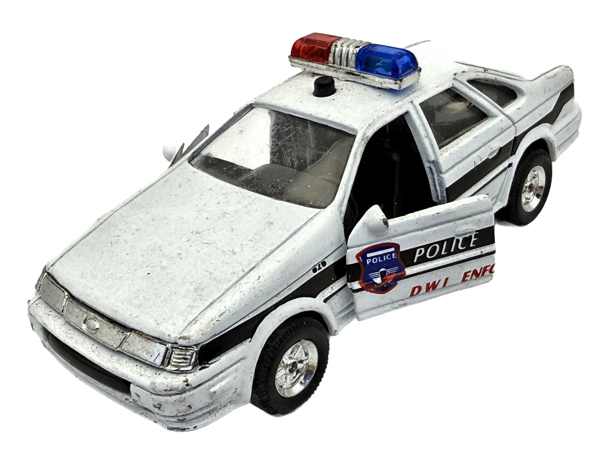 SHOWCASTS FORD TAURUS POLICE POLICJA Welly Biały 1:30
