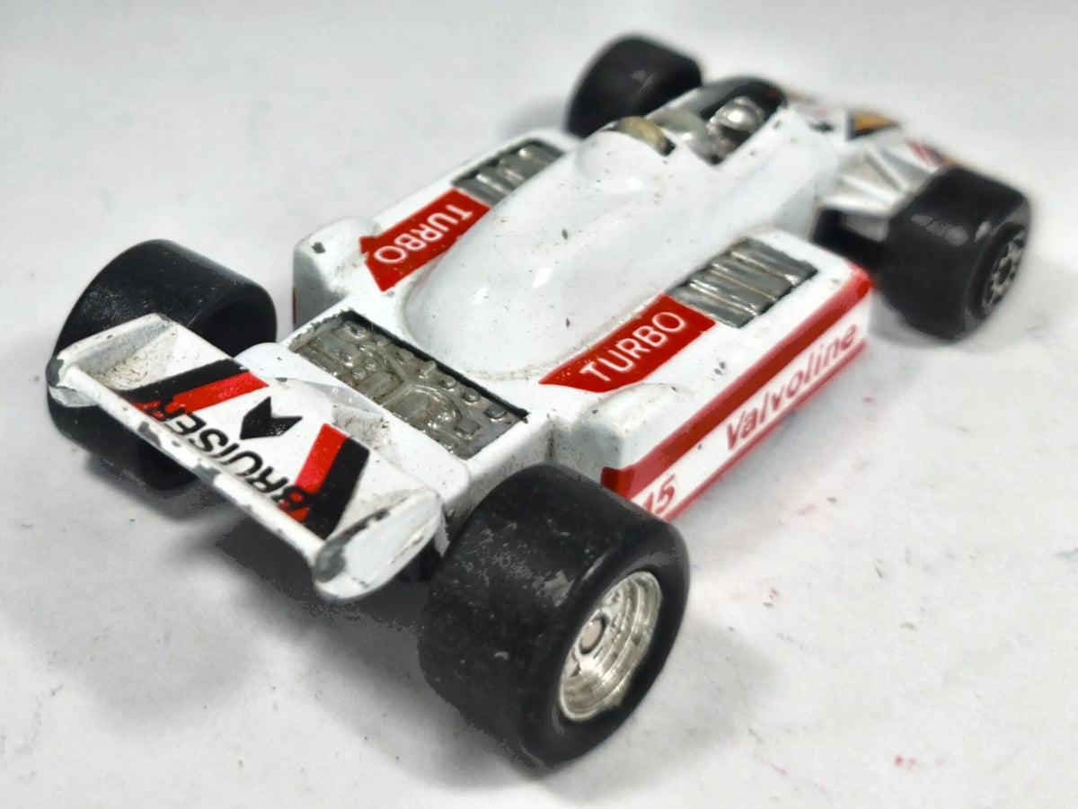 Formuła 1 MC Toy Juniors 1:64 Bolid F1 Valvoline BP Turbo / Bruiser Luzak – zdjęcie 3