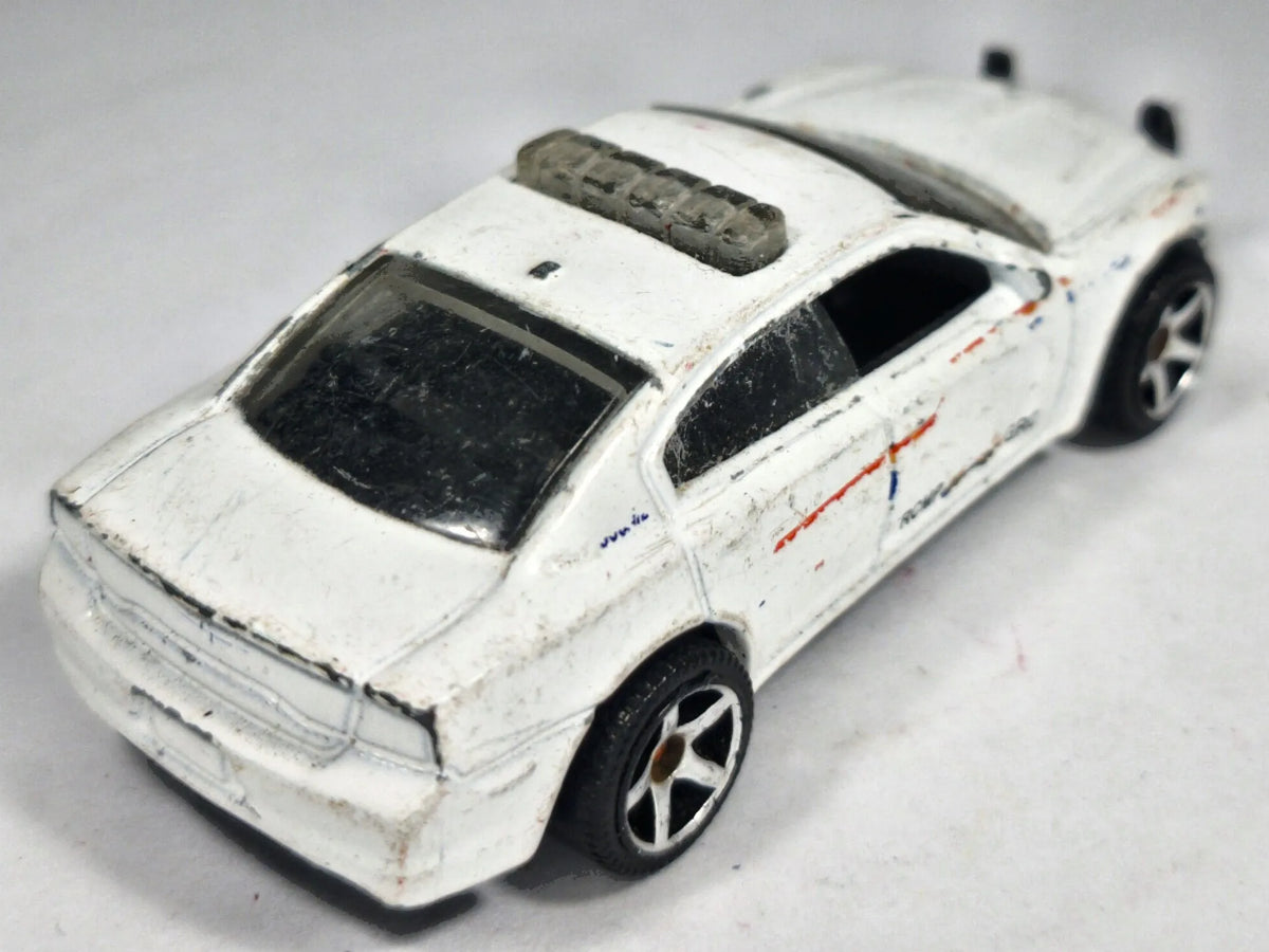 Dodge Charger Pursuit Policja Matchbox 2012 Biały 1:57 – zdjęcie 3