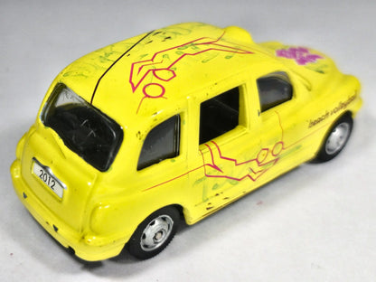 LONDON TAXIS TX1 TAX1 Corgi 2007 Żółty 1:52 – zdjęcie 3