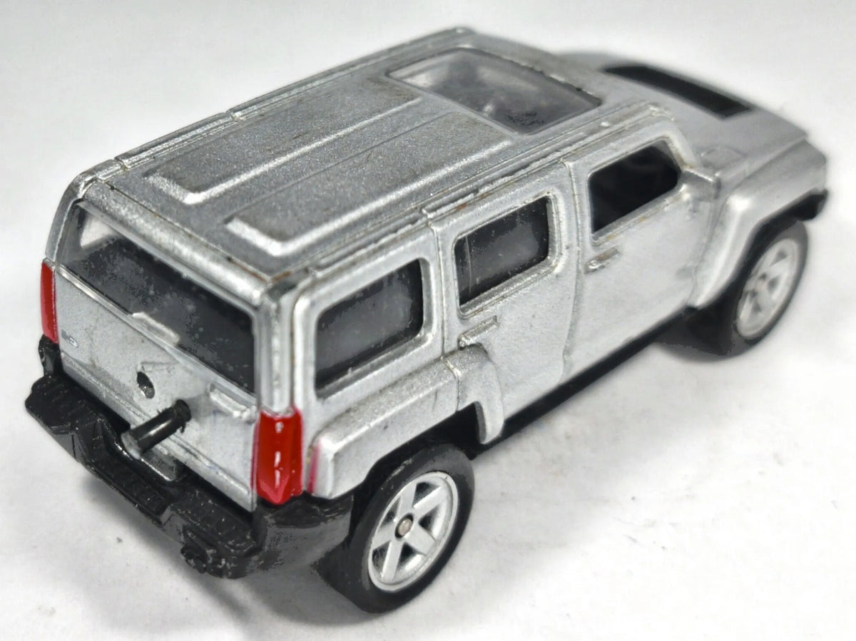 Hummer H2 Welly 1:64 Luzak Srebrny – zdjęcie 3