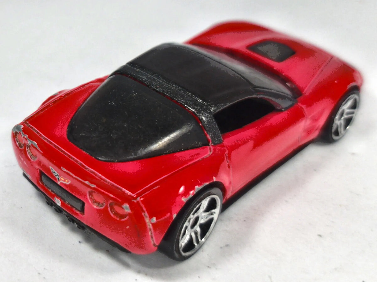'09 Chevrolet Corvette C6 Hot Wheels 2004 1:64 Luzak Czerwony – zdjęcie 3