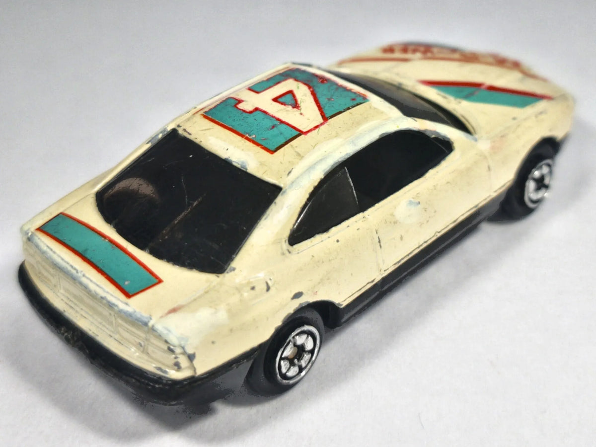 Jak BMW 850i Seria E31, M-Power #4, Die cast NO.804, Kremowy 1:64, Resoraki – zdjęcie 3