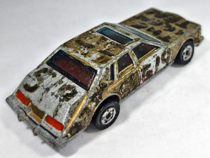 CADILLAC SEVILLE Hot Wheels 1990 Złoty 1:60 – zdjęcie 3