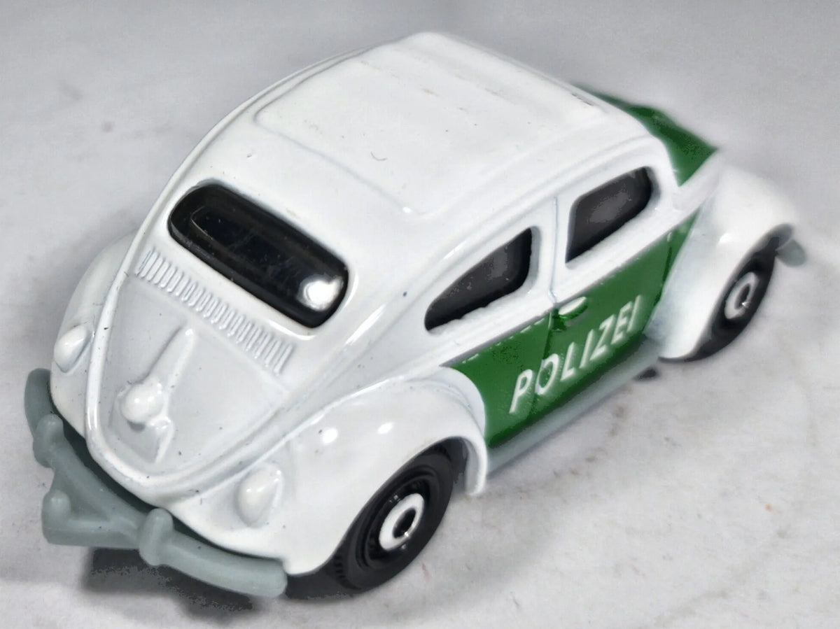 '62 Volkswagen Beetle Mainline Policja Matchbox 1998 Biały 1:55 – zdjęcie 3