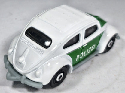 '62 Volkswagen Beetle Mainline Policja Matchbox 1998 Biały 1:55 – zdjęcie 3