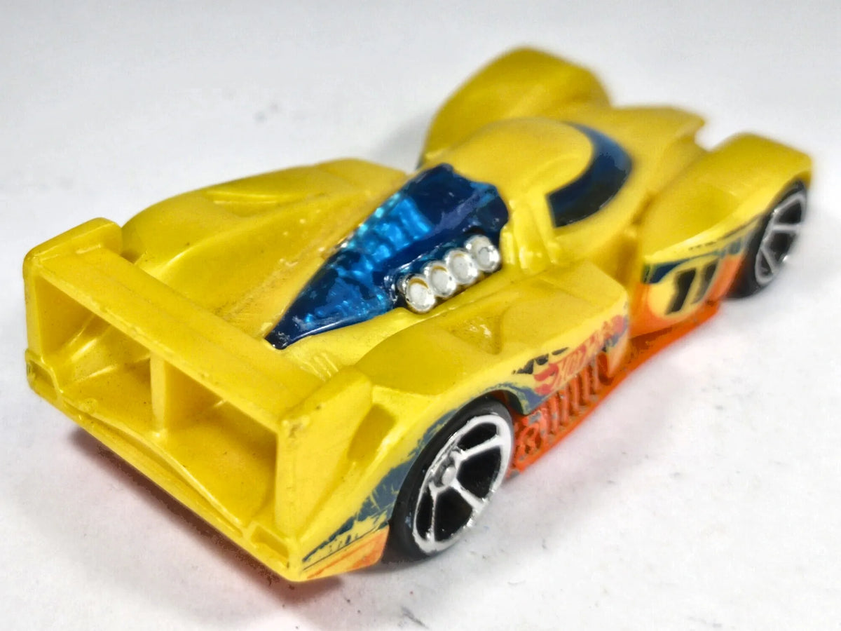 '24 Ours Hot Wheels 2010 1:64 Luzak Żółty – zdjęcie 3