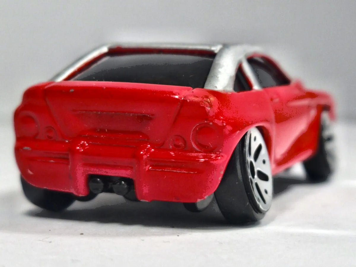 Jeep Jeepster Maisto 2009 Czerwony 1:64 – zdjęcie 6