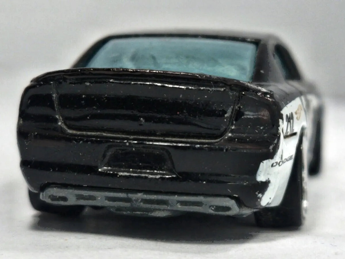 Dodge Charger R/T Hot Wheels 2011 1:64 TO PROTECT AND SERVE Luzak Policja – zdjęcie 6