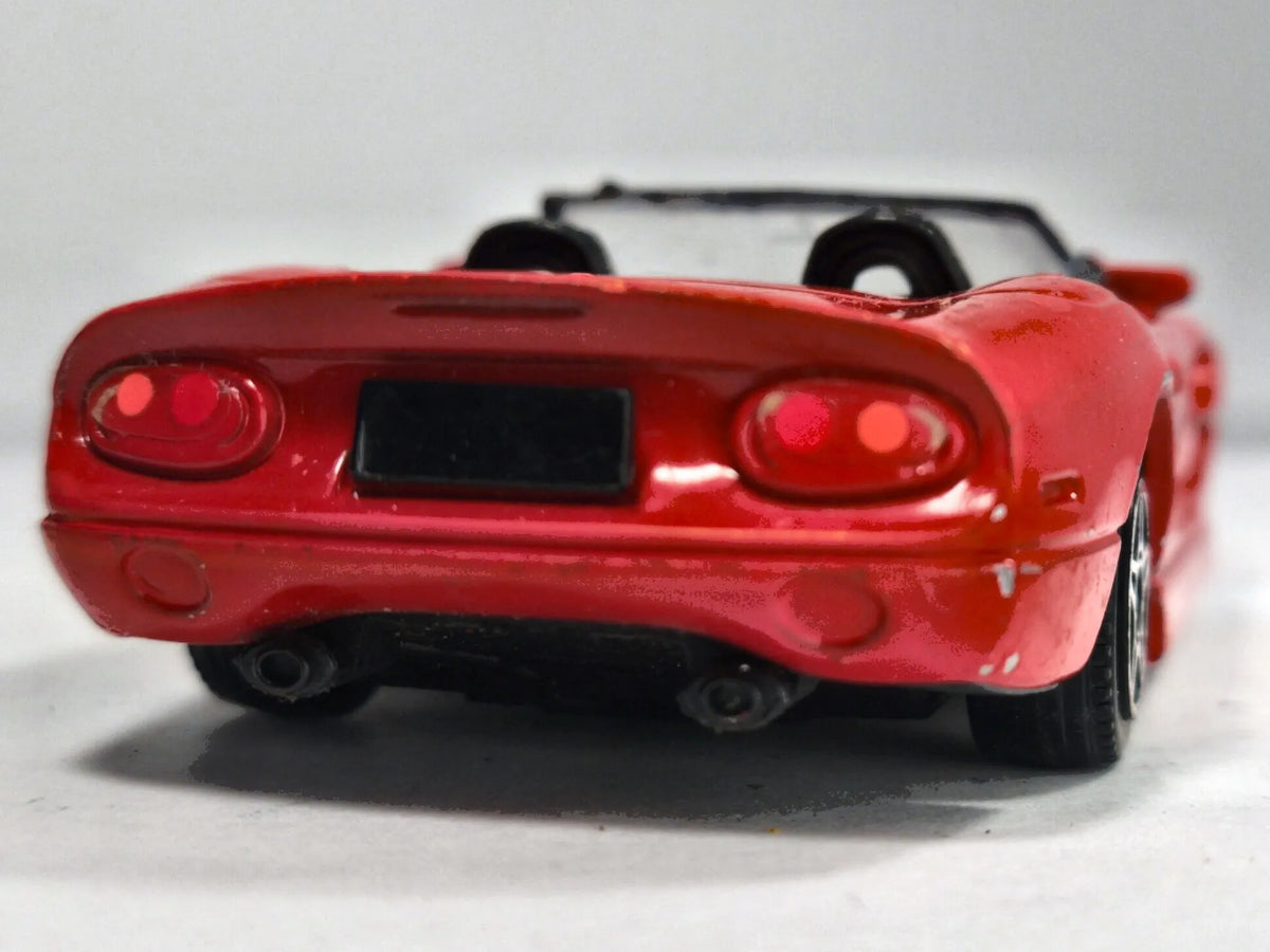 SHELBY SERIES 1 CABRIO Bburago Made in Italy Czerwony 1:43 – zdjęcie 6
