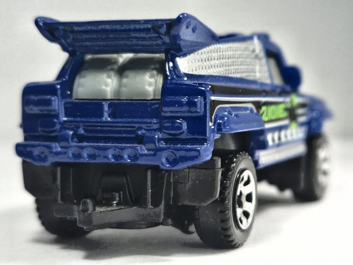 RIDGE RAIDER, DINOM8X, Matchbox 2006 Die cast M8716 Niebieski 1:64 Resoraki – zdjęcie 6