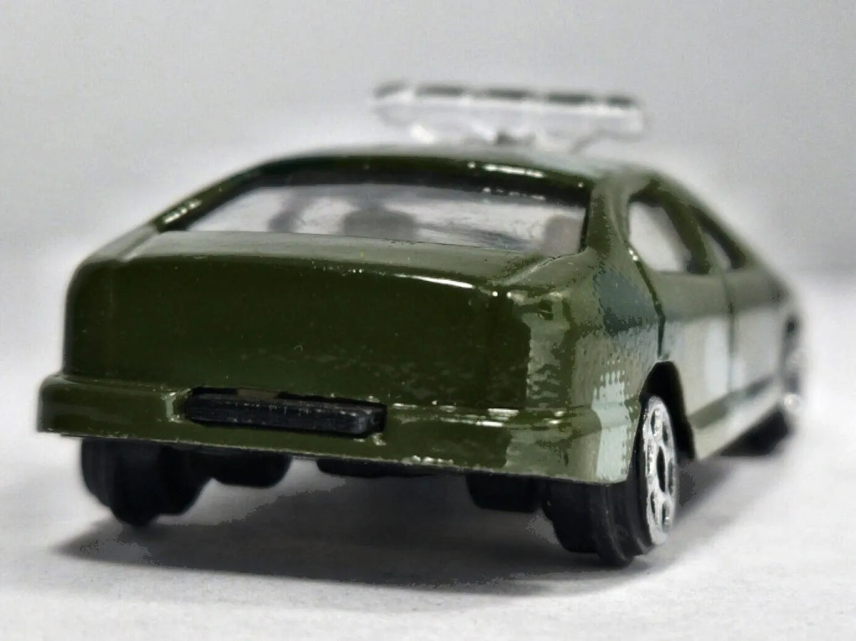 JAK FORD TAURUS WOJSKOWY PATROL POLICJA Pioneer Zielony 1:64 – zdjęcie 6