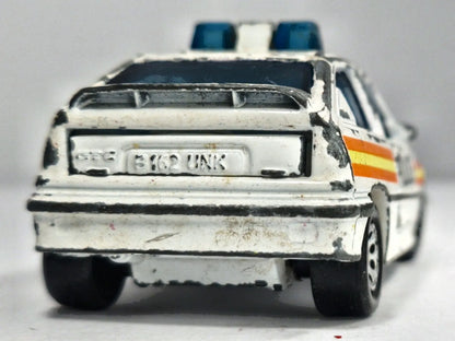 VAUXHALL ASTRA GTE / OPEL KADETT GSI POLICE, Matchbox 1985, Biały, 1:64 – zdjęcie 6